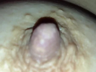 Touching Chinese girlfriend's boobs while s.